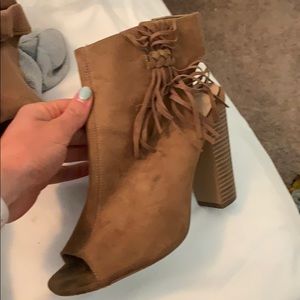 Tassels on open toed booties
